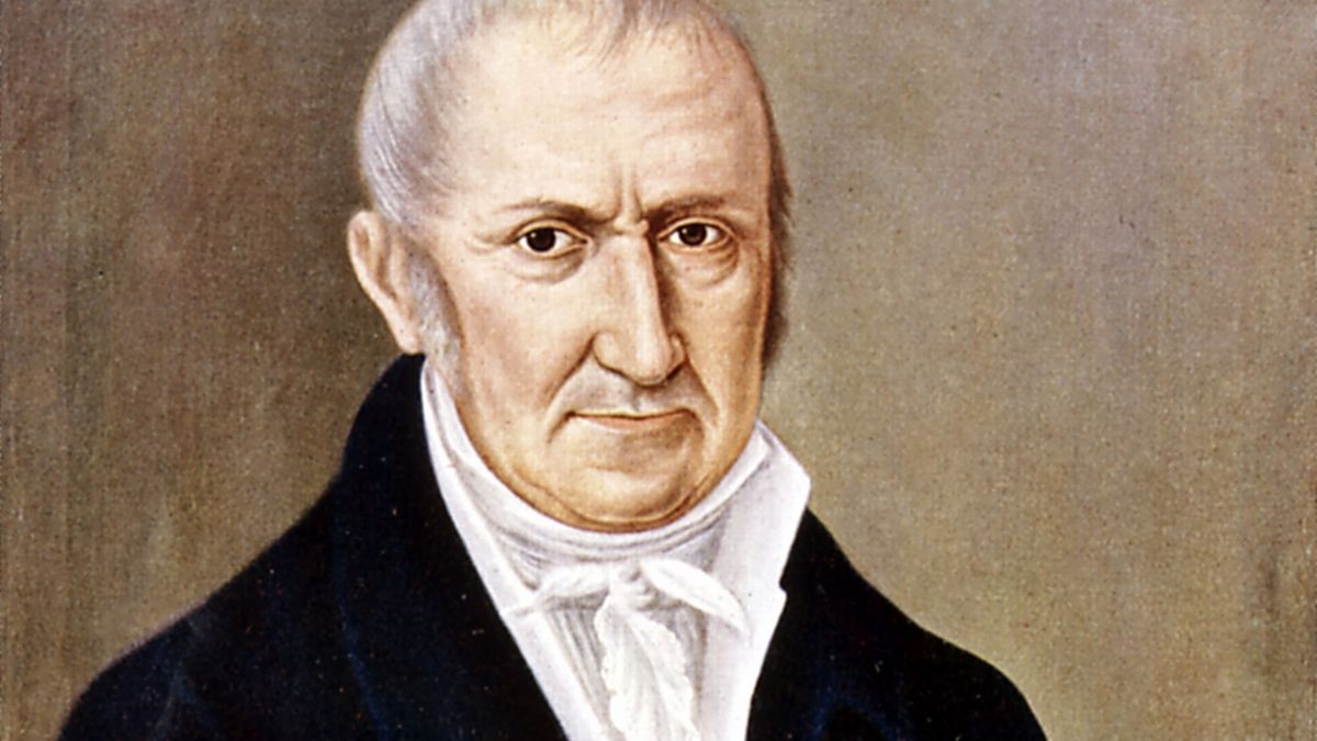 Egy férfi portréja, aki a Volta-elem feltalálója volt, komoly arckifejezéssel.